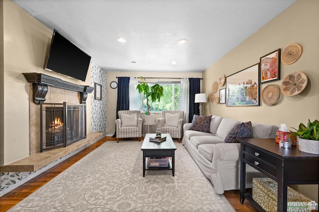 1770 E Vine St S, Salt Lake City, UT 84121 - living room with wood finished floors, a fireplace, and recessed lighting