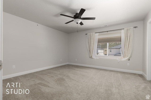 668 E Fiddlers Cove Dr Unit 35, Cedar City, UT 84721 - spare room featuring carpet and ceiling fan