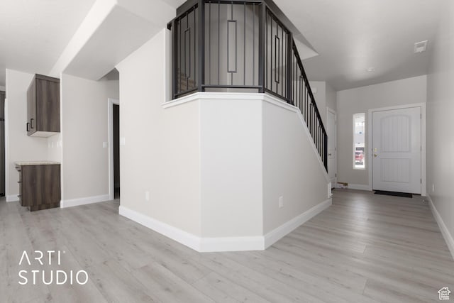 668 E Fiddlers Cove Dr Unit 35, Cedar City, UT 84721 - foyer with light wood-style flooring and stairs