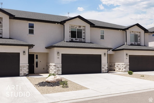 668 E Fiddlers Cove Dr Unit 35, Cedar City, UT 84721 - view of front of house with an attached garage, stone siding, and stucco siding