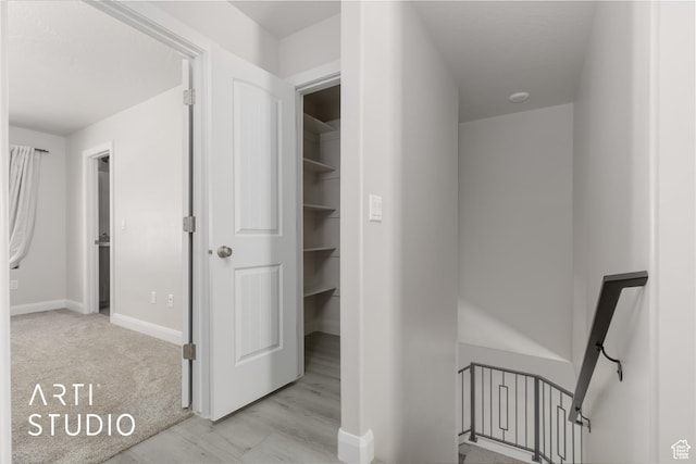 668 E Fiddlers Cove Dr Unit 35, Cedar City, UT 84721 - corridor featuring an upstairs landing and wood finished floors
