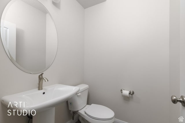 668 E Fiddlers Cove Dr Unit 35, Cedar City, UT 84721 - bathroom featuring toilet and a sink