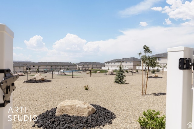 668 E Fiddlers Cove Dr Unit 35, Cedar City, UT 84721 - view of yard with a residential view
