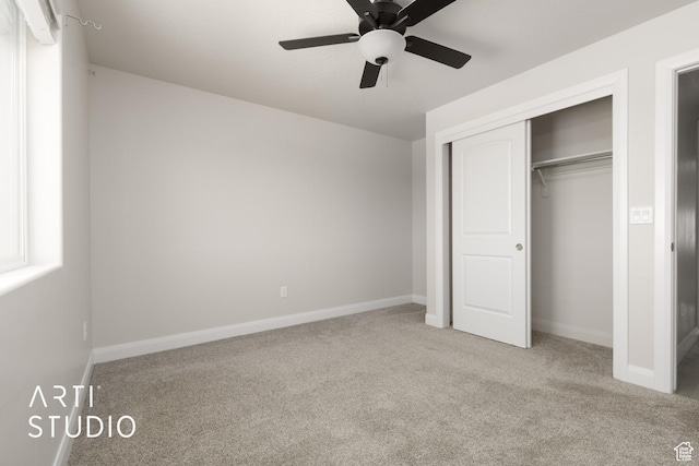 668 E Fiddlers Cove Dr Unit 35, Cedar City, UT 84721 - unfurnished bedroom featuring carpet flooring, a closet, and ceiling fan