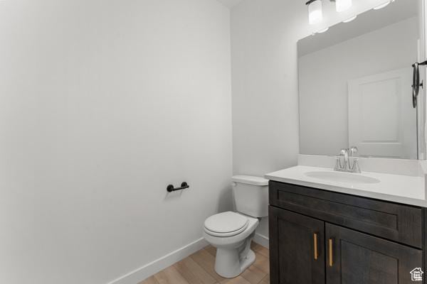 737 N Plainsman Dr Unit 108, Spanish Fork, UT 84660 - bathroom featuring vanity and wood finished floors