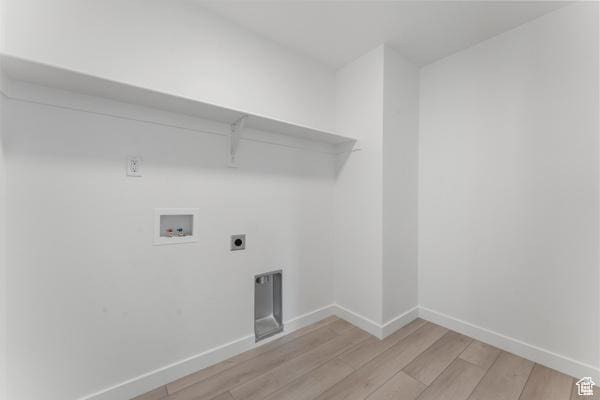 737 N Plainsman Dr Unit 108, Spanish Fork, UT 84660 - laundry area with hookup for a washing machine, light wood-style flooring, and hookup for an electric dryer