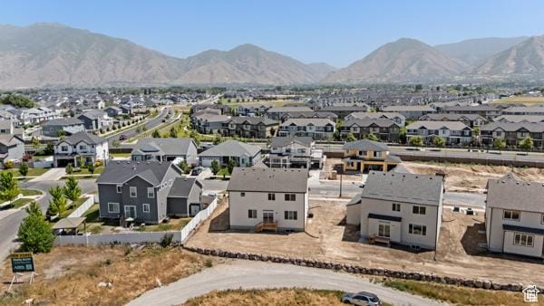 737 N Plainsman Dr Unit 108, Spanish Fork, UT 84660 - aerial perspective of suburban area featuring a mountainous background