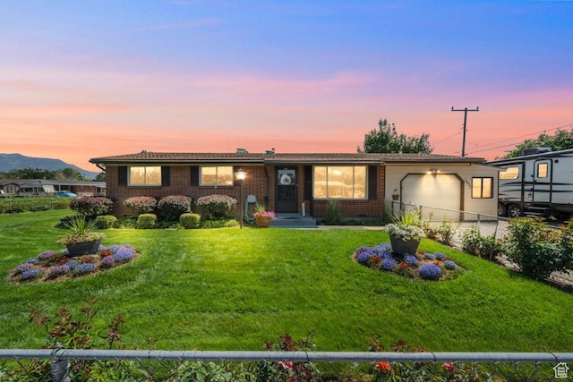 1632 Bennett St, Layton, UT 84041 - single story home featuring an attached garage, brick siding, and a mountain view