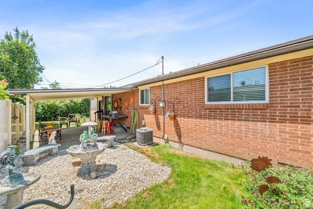 1632 Bennett St, Layton, UT 84041 - rear view of house with a patio and brick siding