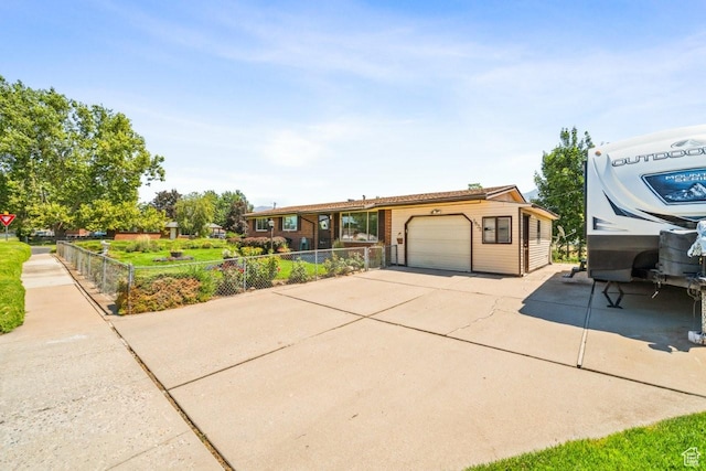 1632 Bennett St, Layton, UT 84041 - ranch-style home featuring driveway and a garage