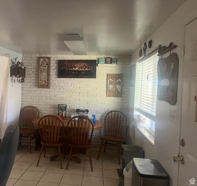 427 E 1070 S, Orem, UT 84097 - dining area with light tile patterned flooring and brick wall