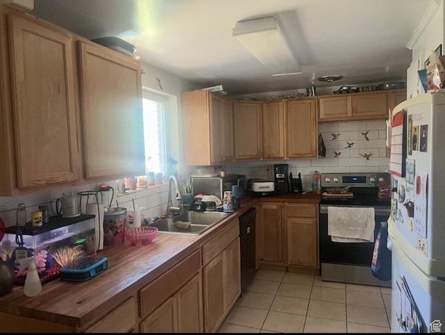 427 E 1070 S, Orem, UT 84097 - kitchen with freestanding refrigerator, stainless steel electric stove, light tile patterned flooring, wood counters, and decorative backsplash
