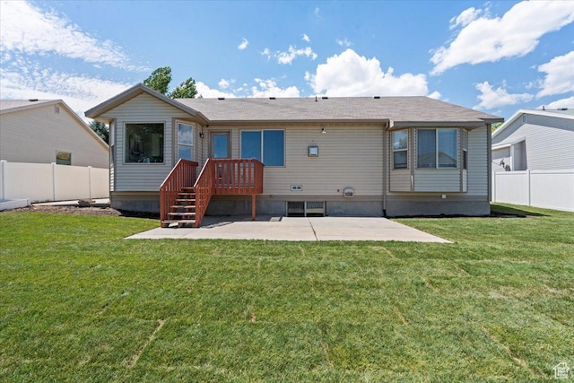 6515 S Mount Whitney Ln, West Valley City, UT 84118 - back of property featuring a patio area and a fenced backyard