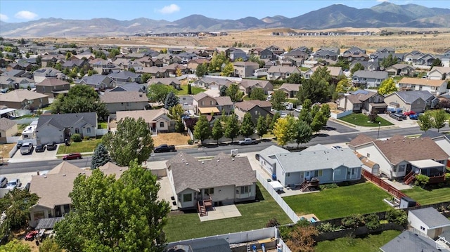 6515 S Mount Whitney Ln, West Valley City, UT 84118 - aerial view of residential area featuring a mountain backdrop