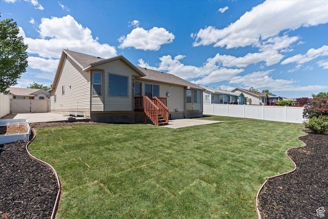 6515 S Mount Whitney Ln, West Valley City, UT 84118 - back of house with a patio area, a fenced backyard, and a gate