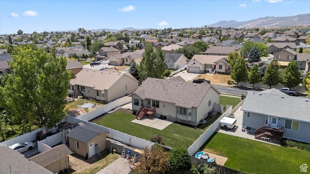 6515 S Mount Whitney Ln, West Valley City, UT 84118 - aerial view of residential area with a mountainous background
