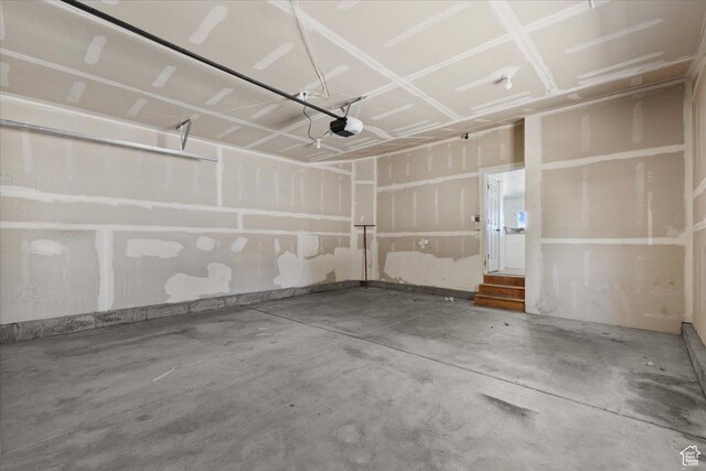 6515 S Mount Whitney Ln, West Valley City, UT 84118 - garage featuring a garage door opener