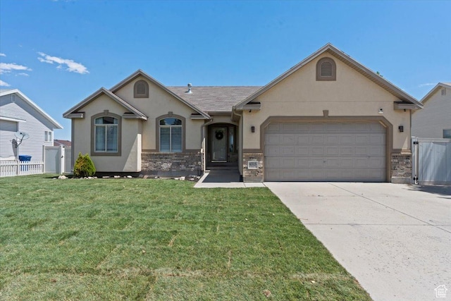 6515 S Mount Whitney Ln, West Valley City, UT 84118 - view of front of house with stucco siding, a garage, concrete driveway, and stone siding