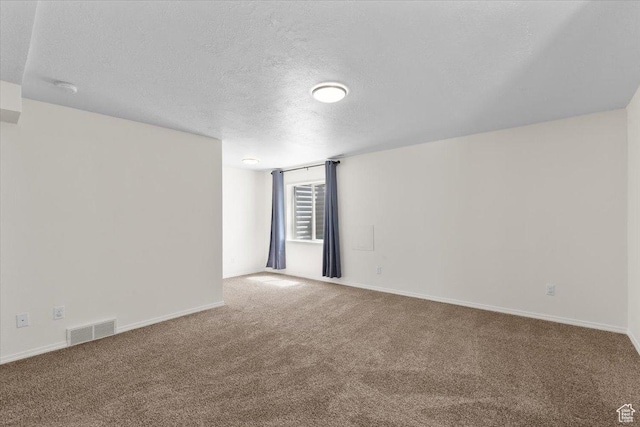 6515 S Mount Whitney Ln, West Valley City, UT 84118 - carpeted spare room with a textured ceiling and a smoke detector
