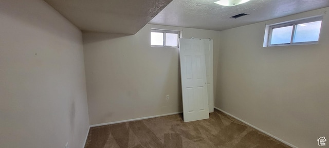 1226 N 450 W, Sunset, UT 84015 - basement with carpet flooring and a textured ceiling