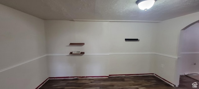 1226 N 450 W, Sunset, UT 84015 - laundry area featuring arched walkways and wood finished floors