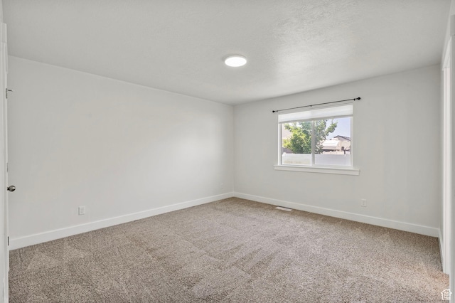 2362 E Quaking Aspen Ln, Eagle Mountain, UT 84005 - spare room featuring carpet floors and a textured ceiling
