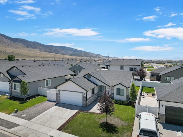 2362 E Quaking Aspen Ln, Eagle Mountain, UT 84005 - aerial view of residential area with a mountainous background