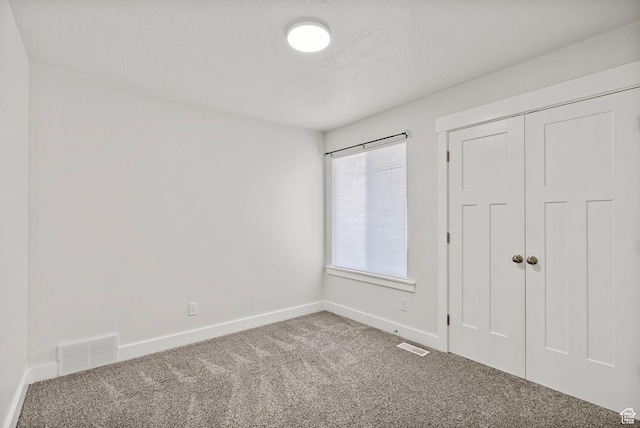 2362 E Quaking Aspen Ln, Eagle Mountain, UT 84005 - unfurnished bedroom with carpet flooring and a closet
