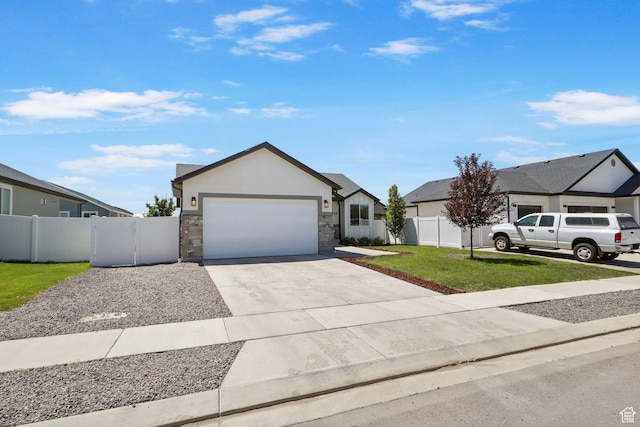 2362 E Quaking Aspen Ln, Eagle Mountain, UT 84005 - ranch-style home featuring concrete driveway, a garage, and stone siding