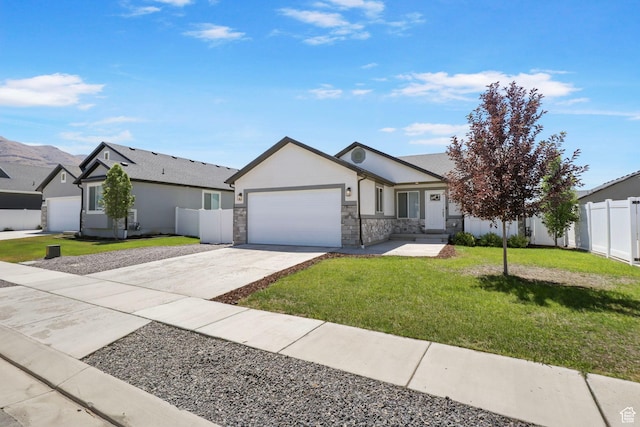 2362 E Quaking Aspen Ln, Eagle Mountain, UT 84005 - ranch-style house featuring a garage, concrete driveway, stucco siding, and stone siding