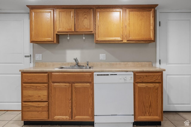 717 E 150 S, Provo, UT 84606 - kitchen with white dishwasher, light tile patterned flooring, light countertops, and brown cabinetry