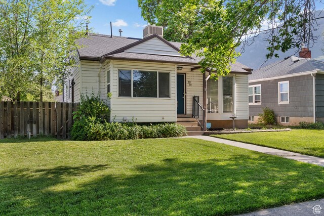 717 E 150 S, Provo, UT 84606 - bungalow-style house with entry steps, a shingled roof, and a chimney