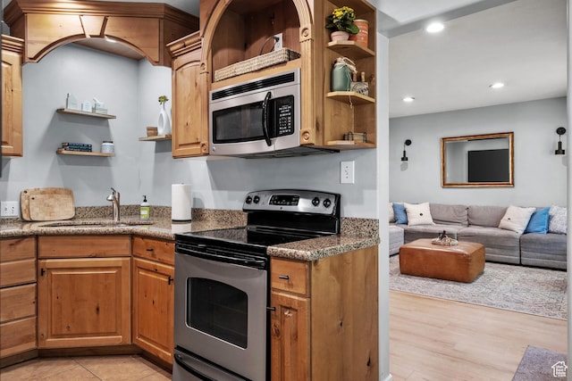 717 E 150 S, Provo, UT 84606 - kitchen featuring open shelves, appliances with stainless steel finishes, open floor plan, stone countertops, and recessed lighting