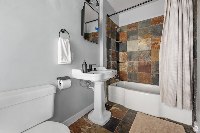 717 E 150 S, Provo, UT 84606 - bathroom featuring stone tile floors and shower / bathtub combination with curtain