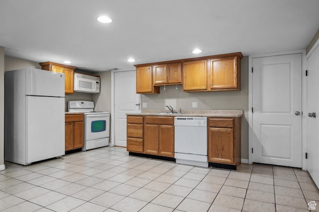 717 E 150 S, Provo, UT 84606 - kitchen with white appliances, light countertops, recessed lighting, brown cabinets, and light tile patterned flooring