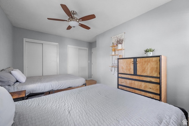 717 E 150 S, Provo, UT 84606 - bedroom with multiple closets, a ceiling fan, and wood finished floors