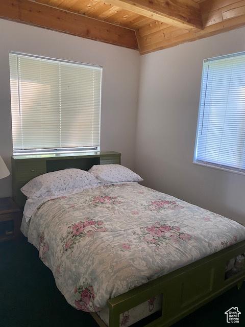 2160 S Aspen Ridge Dr, Coalville, UT 84017 - bedroom featuring a wood ceiling with exposed beams