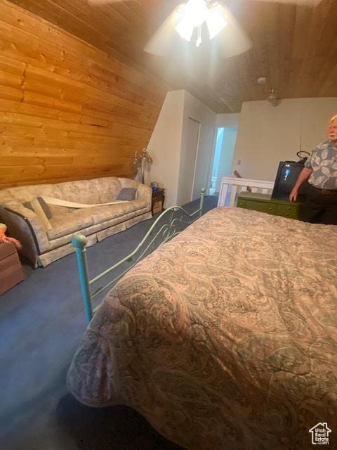 2160 S Aspen Ridge Dr, Coalville, UT 84017 - carpeted bedroom featuring wooden walls and wood ceiling