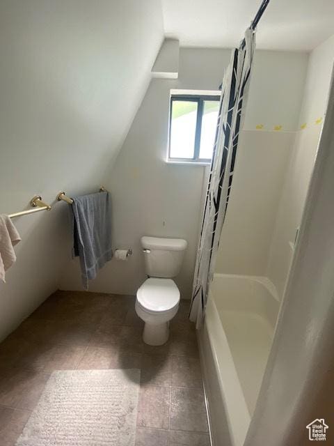 2160 S Aspen Ridge Dr, Coalville, UT 84017 - bathroom featuring lofted ceiling, shower / tub combo, and tile patterned floors