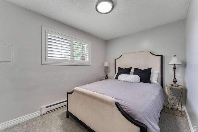 211 N 800 E, Bountiful, UT 84010 - bedroom featuring a baseboard radiator, carpet flooring, and a textured ceiling