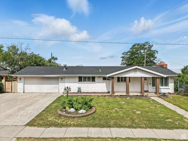 211 N 800 E, Bountiful, UT 84010 - ranch-style house featuring covered porch, an attached garage, a front yard, and driveway