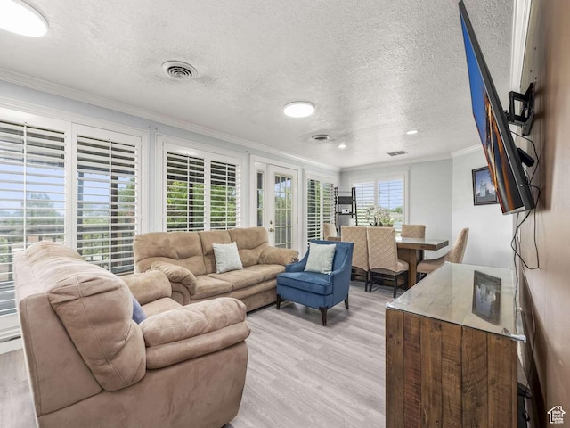 211 N 800 E, Bountiful, UT 84010 - living area with light wood-type flooring, ornamental molding, a textured ceiling, and recessed lighting
