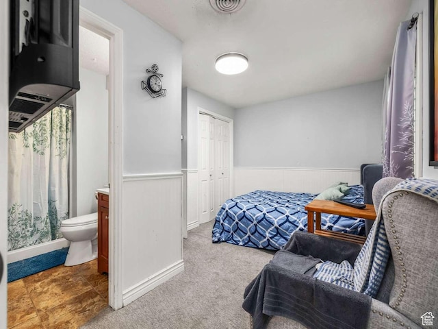 211 N 800 E, Bountiful, UT 84010 - bedroom featuring wainscoting, ensuite bathroom, a closet, and carpet floors