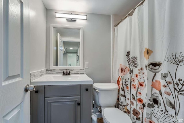 211 N 800 E, Bountiful, UT 84010 - bathroom featuring vanity, decorative backsplash, and a shower with curtain