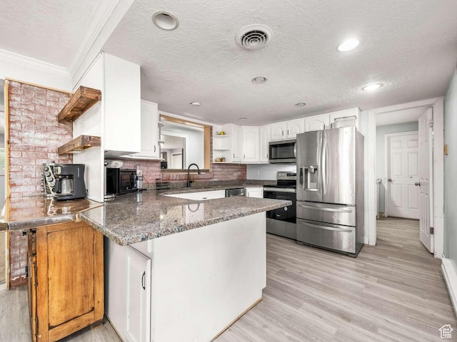 211 N 800 E, Bountiful, UT 84010 - kitchen featuring appliances with stainless steel finishes, open shelves, a peninsula, white cabinets, and a textured ceiling