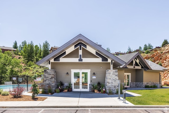 3302 Quarry Springs Dr, Park City, UT 84098 - view of front of house with french doors and stone siding