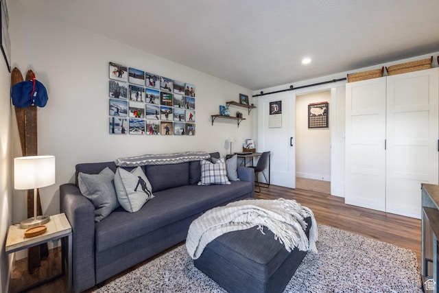 3302 Quarry Springs Dr, Park City, UT 84098 - living area featuring wood finished floors, a barn door, and recessed lighting