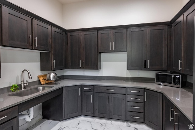 3302 Quarry Springs Dr, Park City, UT 84098 - kitchen featuring stainless steel microwave, light marble finish flooring, and dark brown cabinets