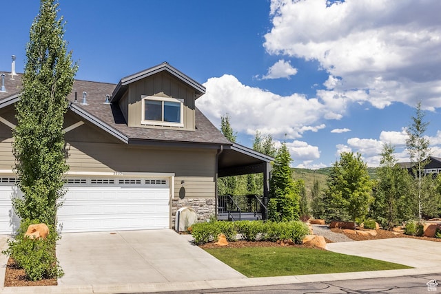 3302 Quarry Springs Dr, Park City, UT 84098 - view of front of property with concrete driveway, stone siding, and a porch