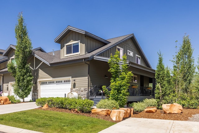 3302 Quarry Springs Dr, Park City, UT 84098 - craftsman-style home featuring board and batten siding, a garage, a porch, driveway, and a shingled roof